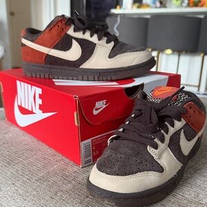 Nike Dunk Low in Black, Cream, and Red